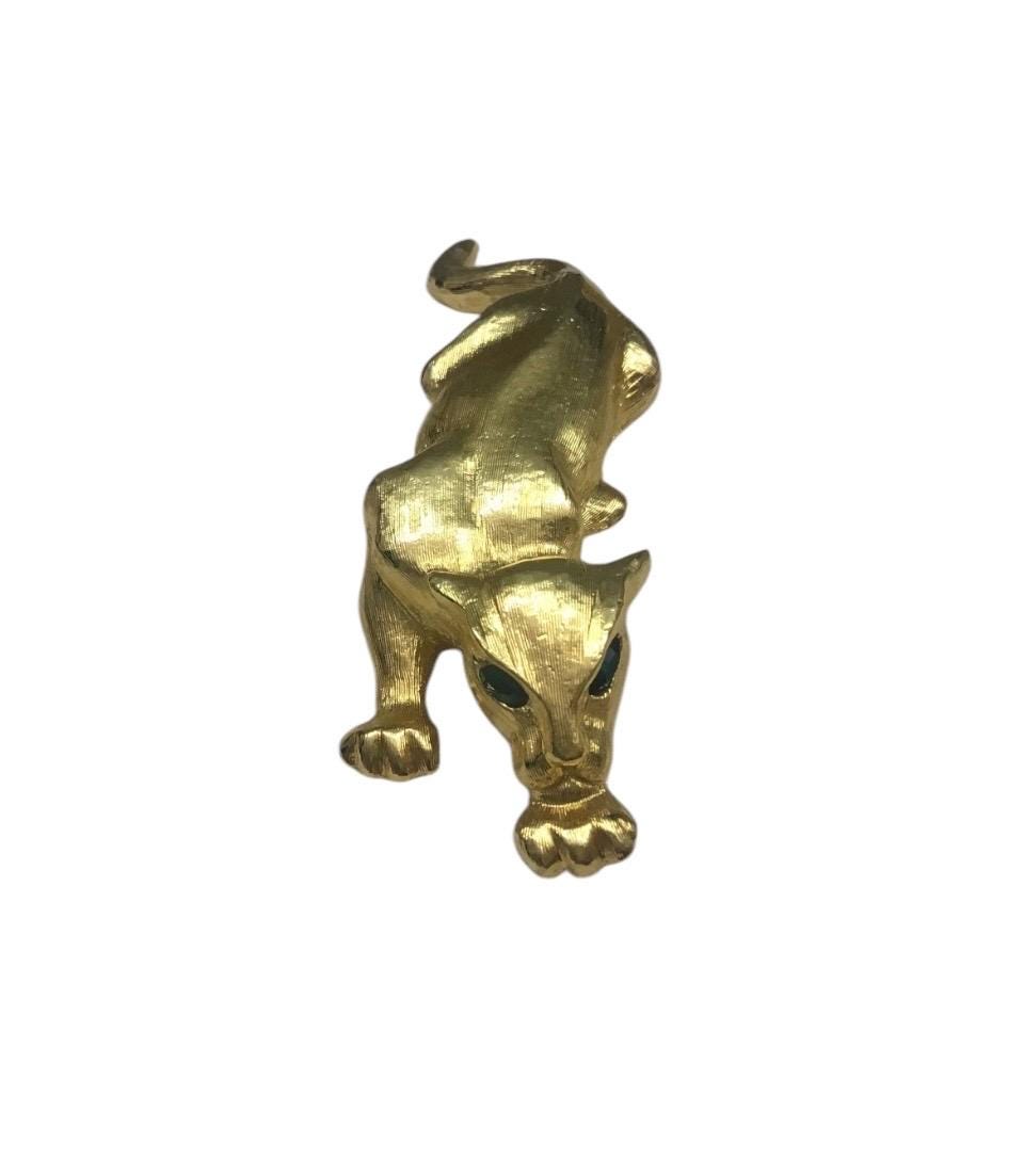 Fancy & Unusual Vintage 1970s leopard brooch with Green rhinestone eyes
