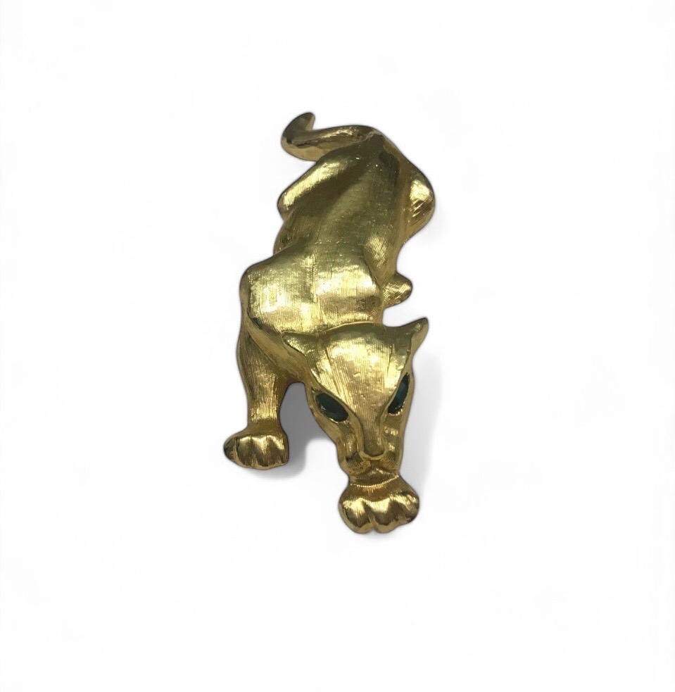 Fancy & Unusual Vintage 1970s leopard brooch with Green rhinestone eyes