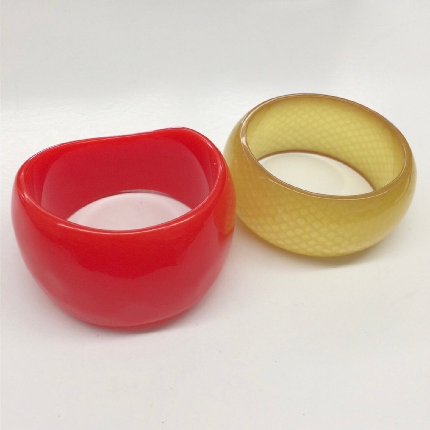 1960 Apple Juice BAKELITE ?semi transparent with a snakelike pattern  Bangle and Red Acylic Resin bangle